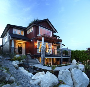 A fully finished Wallmark Custom home in North Vancouver complete with a walk out basement and a beautiful patio that takes in the views of the Vancouver harbour below.